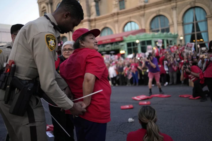 Dozens of union workers arrested on Las Vegas Strip for blocking traffic as thousands rally