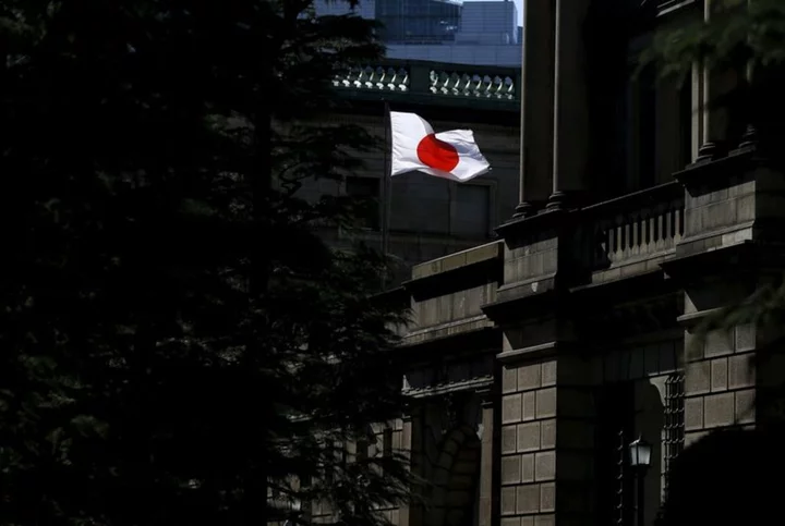 Japan's govt cuts growth forecast, sees inflation exceeding BOJ target