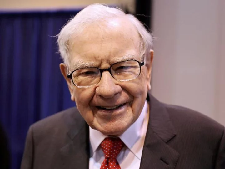 Berkshire Hathaway swings to a profit, boosted by massive investment gains