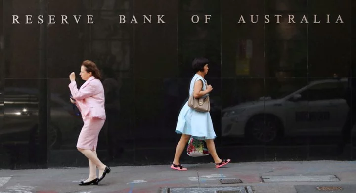 Australia's central bank holds rates, signals more hikes maybe required