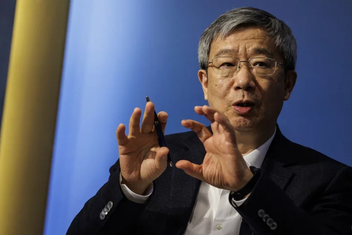 China’s New PBOC Chief Faces Big Test on World Stage
